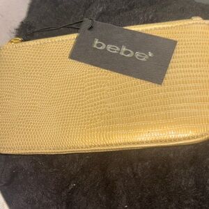 bebe Gold Lizard-Embossed Wristlet Clutch